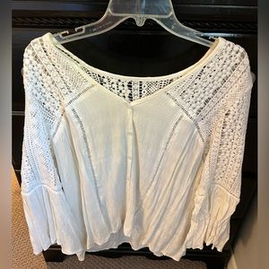 White flowing button up top
